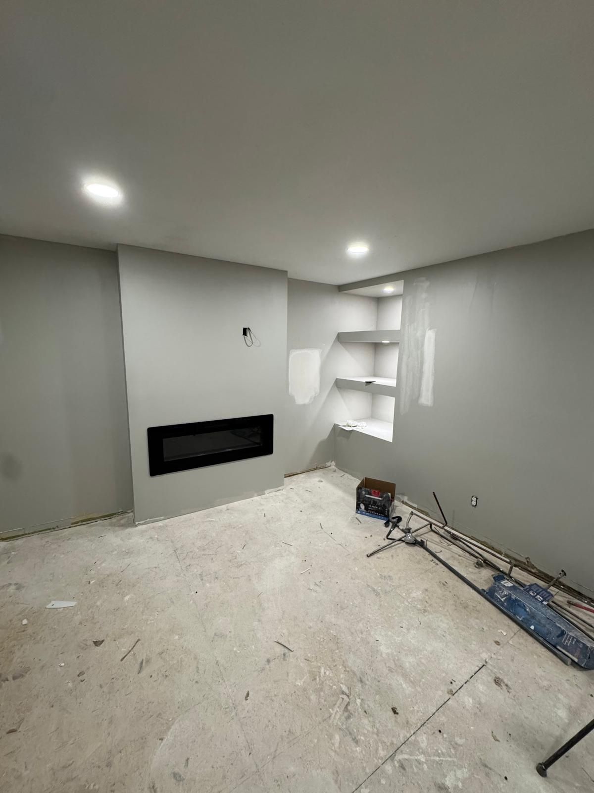 Adding a fireplace to the family room — after